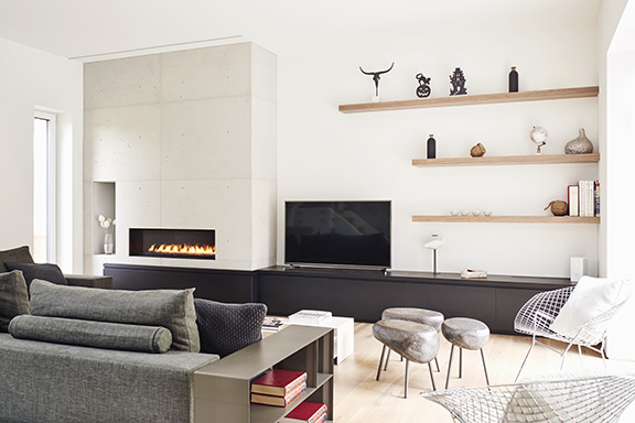 White Raw Concrete Fireplace Surround with Raw Precast Concrete Panels