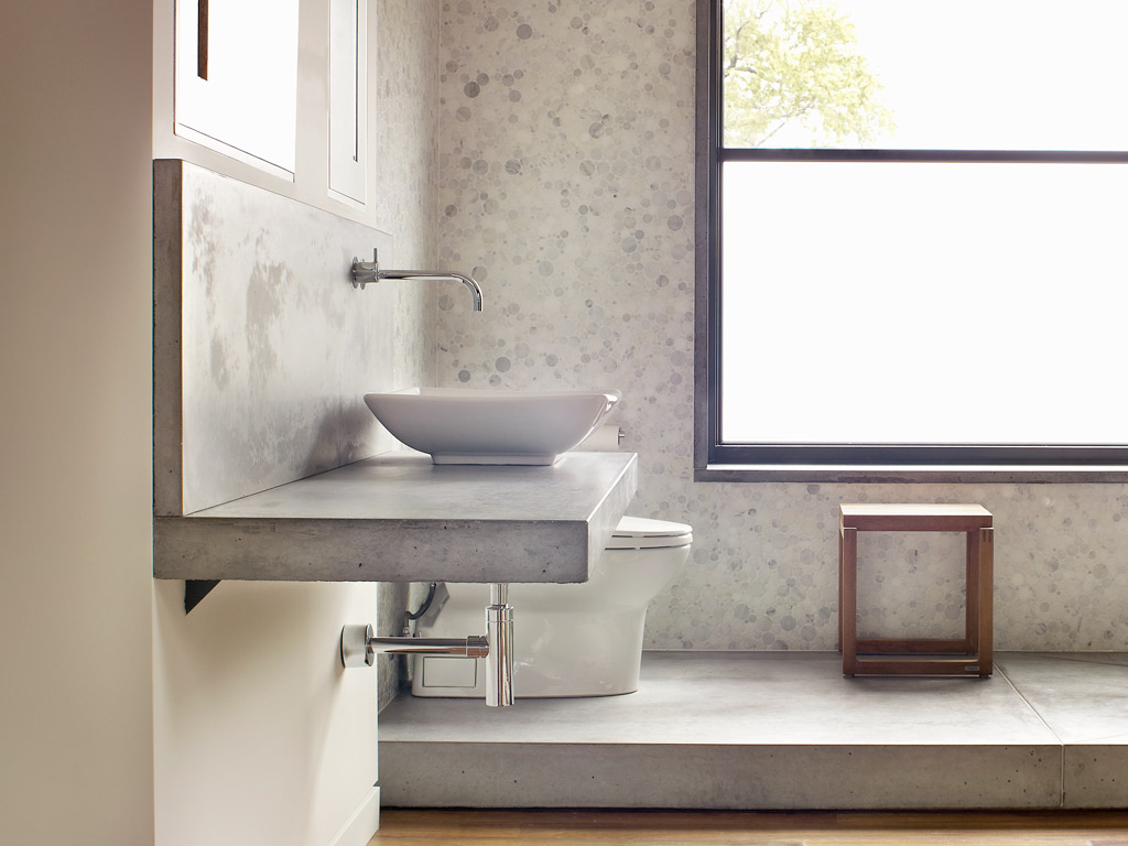 modern vanity in concrete creates sleek design lines