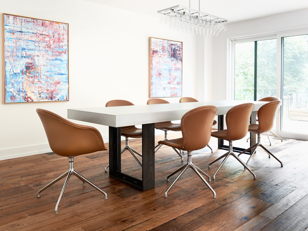 chunky concrete table top in modern home in the colour buff