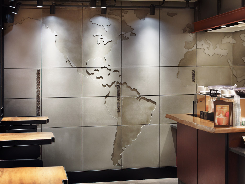 custom relief wall panels at Starbucks Toronto location world map technique