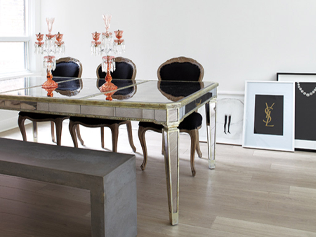 robust concrete dining table bench seating in a luxurious high end home