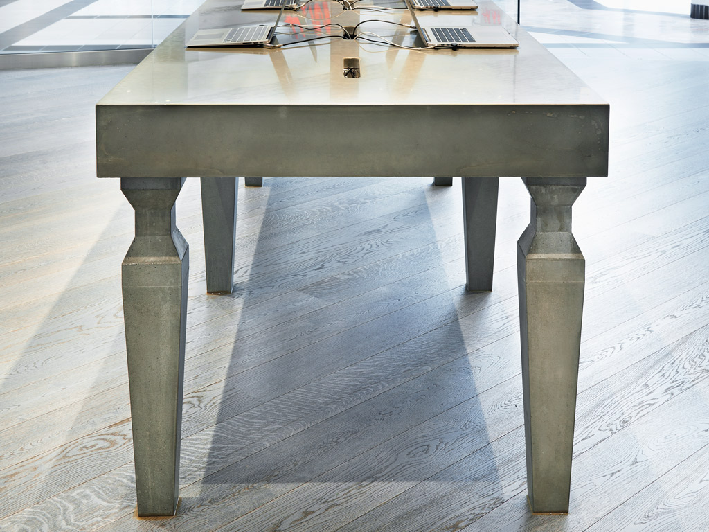 Concrete display table for a retail store