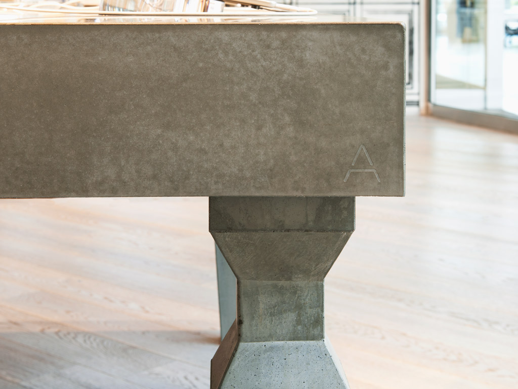 closeup of small details in custom concrete retail table