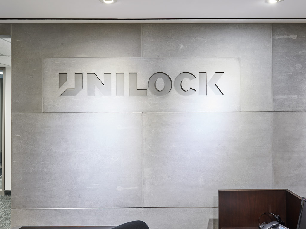 feature wall panel front desk area unilock head office Toronto