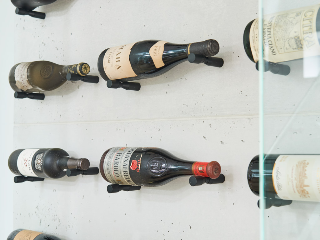 closeup shot of wine cellar wall panels with integral pegs